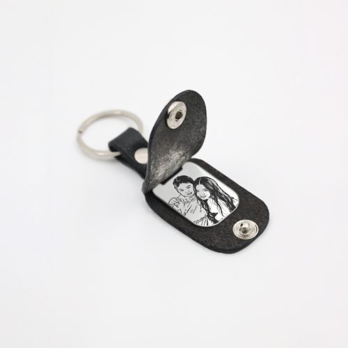 Llavero rectangular en plata 950  y cuero