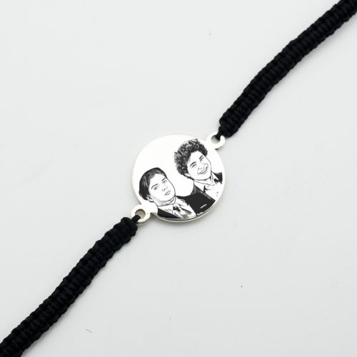Pulsera circular grabada en plata 950 e hilo trenzado para caballero
