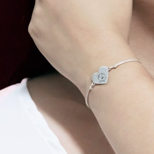 Pulsera corazón grabada en plata e hilo para dama
